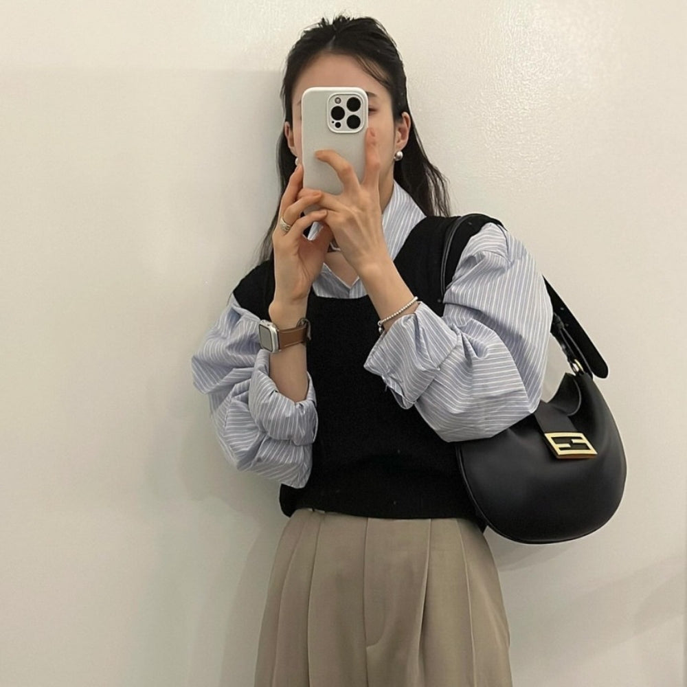 ラウンドネックケーブルニットベスト