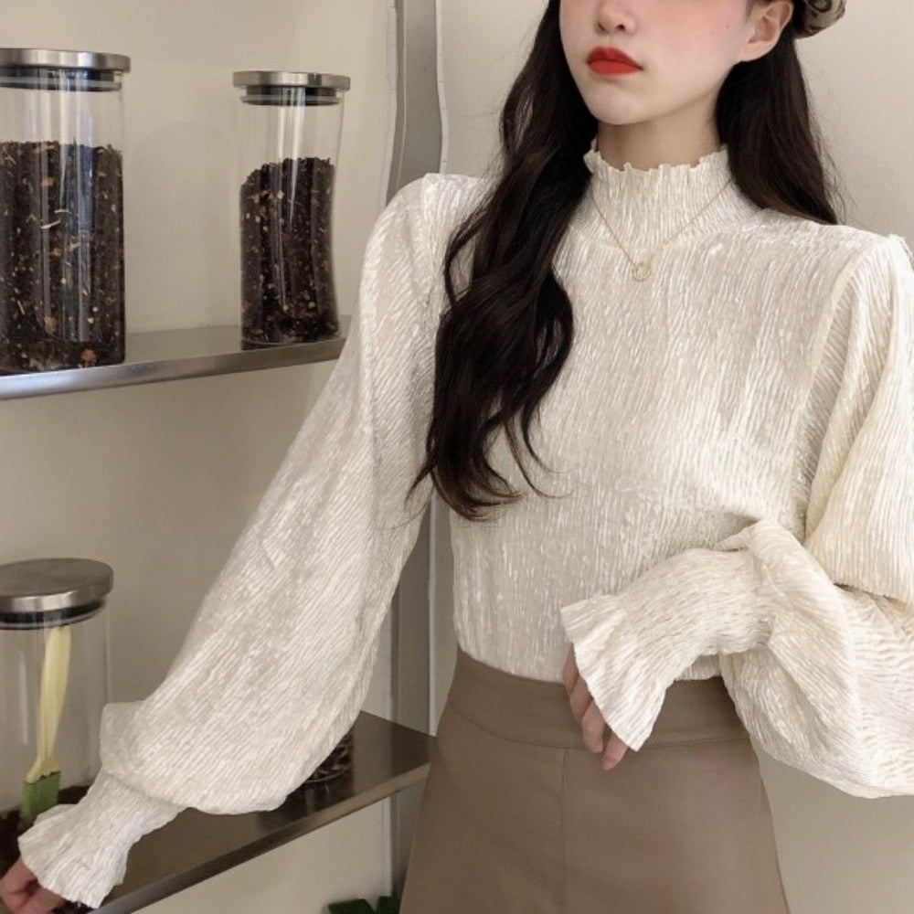 ハーフネックボリュームスリーブトップス